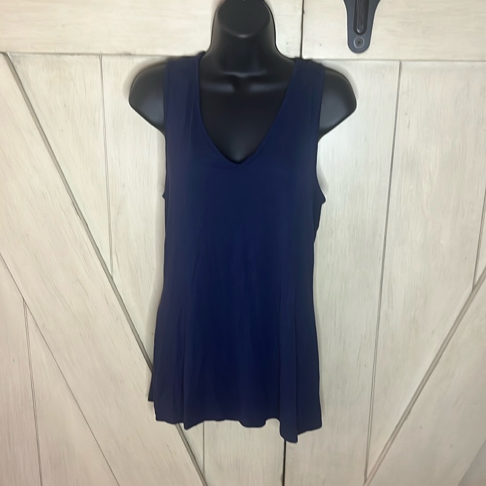 Blue tank with distressed flag in back